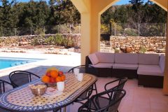 The veranda (one of two large ones on the property) also provides comfortable seating in shade.  a perfect opportunity to relax, read a book or just take in the views.